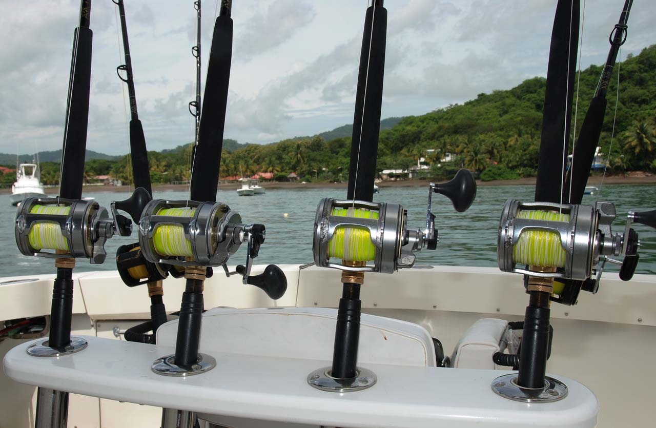 Fishing reels lined up on the back of Bushwacker